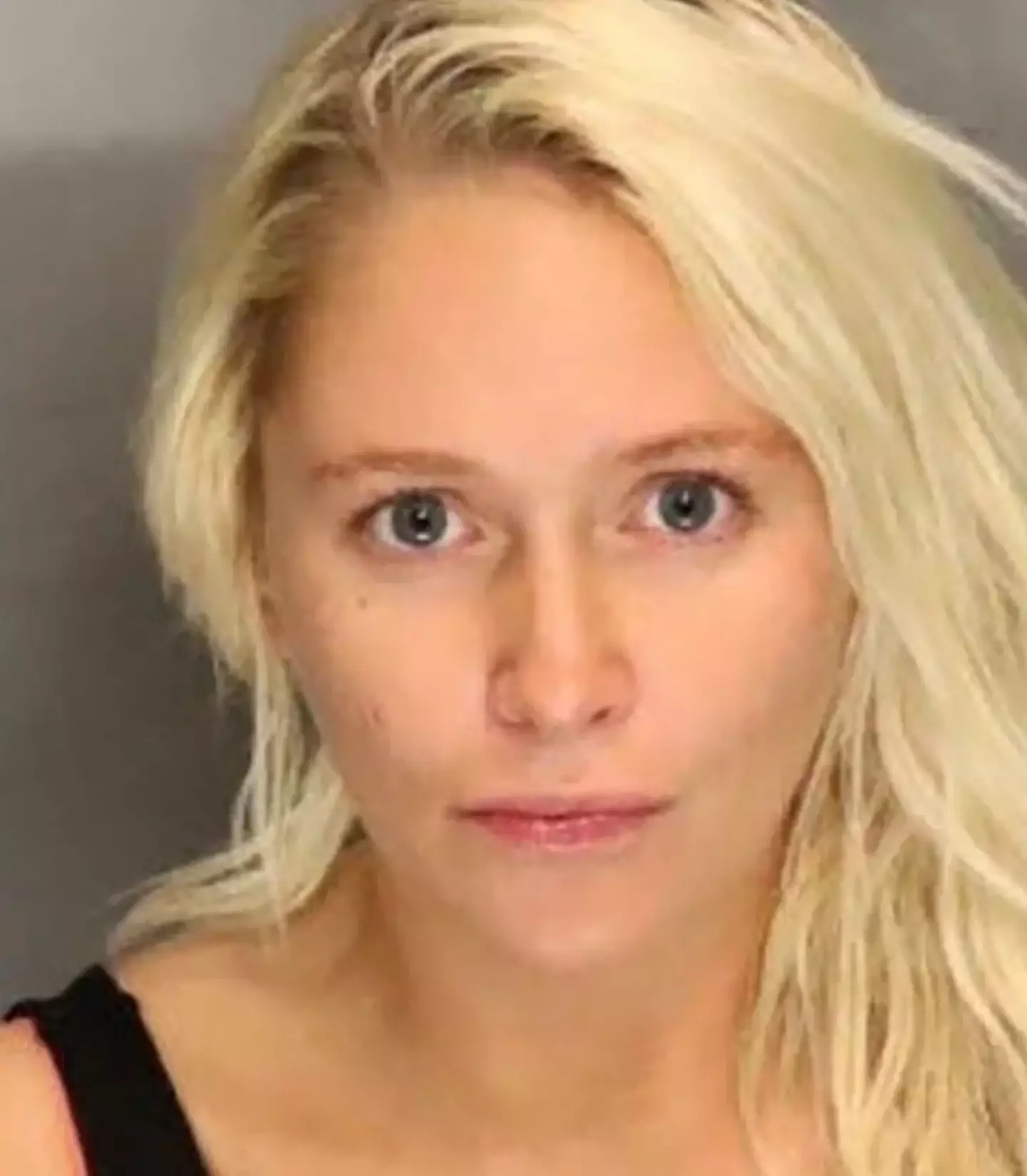 A former Playboy model could face up to 25 years behind bars after a 71-year-old man was found dead in the boot of her car.