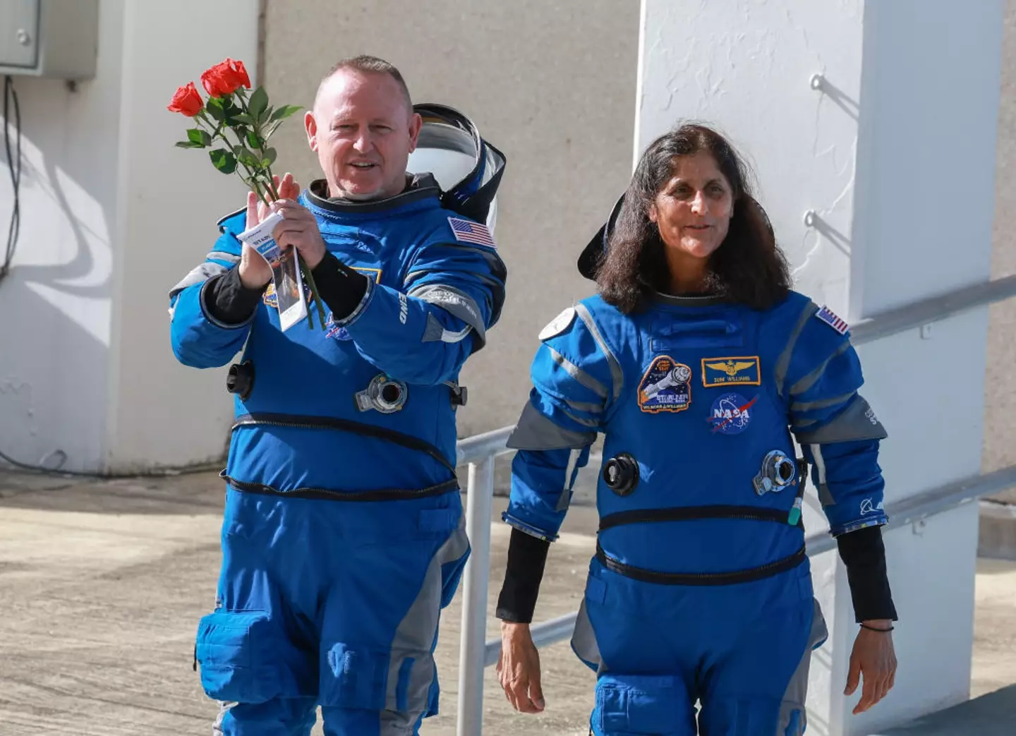 Wilmore and Williams pictured before they left Earth in June last year - they'll be getting plenty of flowers on their return (Joe Raedle/Getty Images)