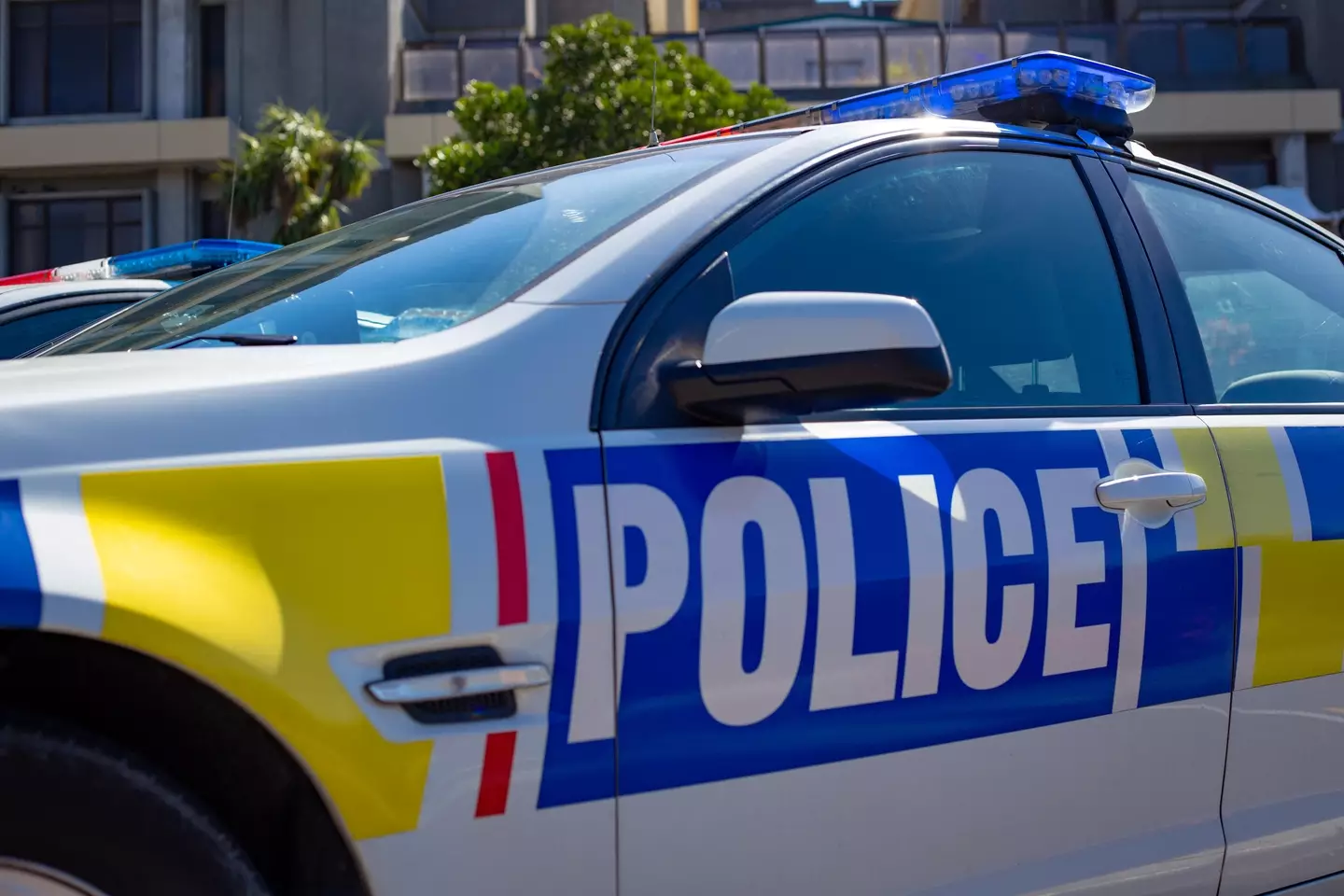 The family's car collided with a semi-trailer on the South Island.