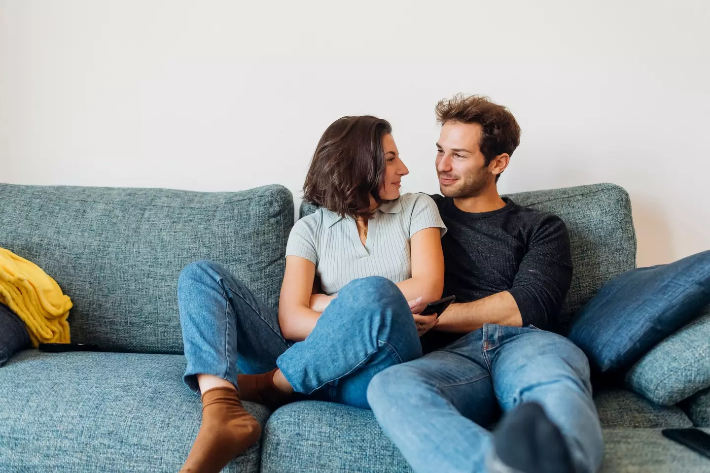 Couples are using their sofas for more than just watching TV (Getty Stock)