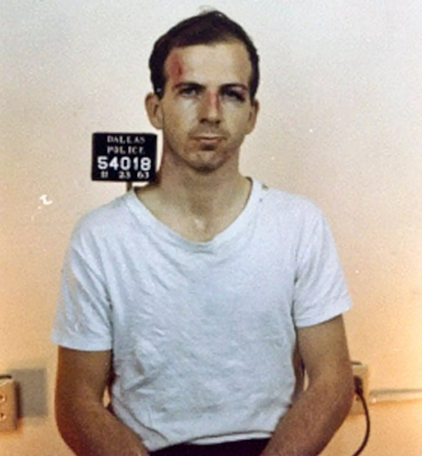 Lee Harvey Oswald in a mug shot after he was arrested for assassinating President John F. Kennedy in Dallas, 23rd November 1963 (Kypros/Getty Images)