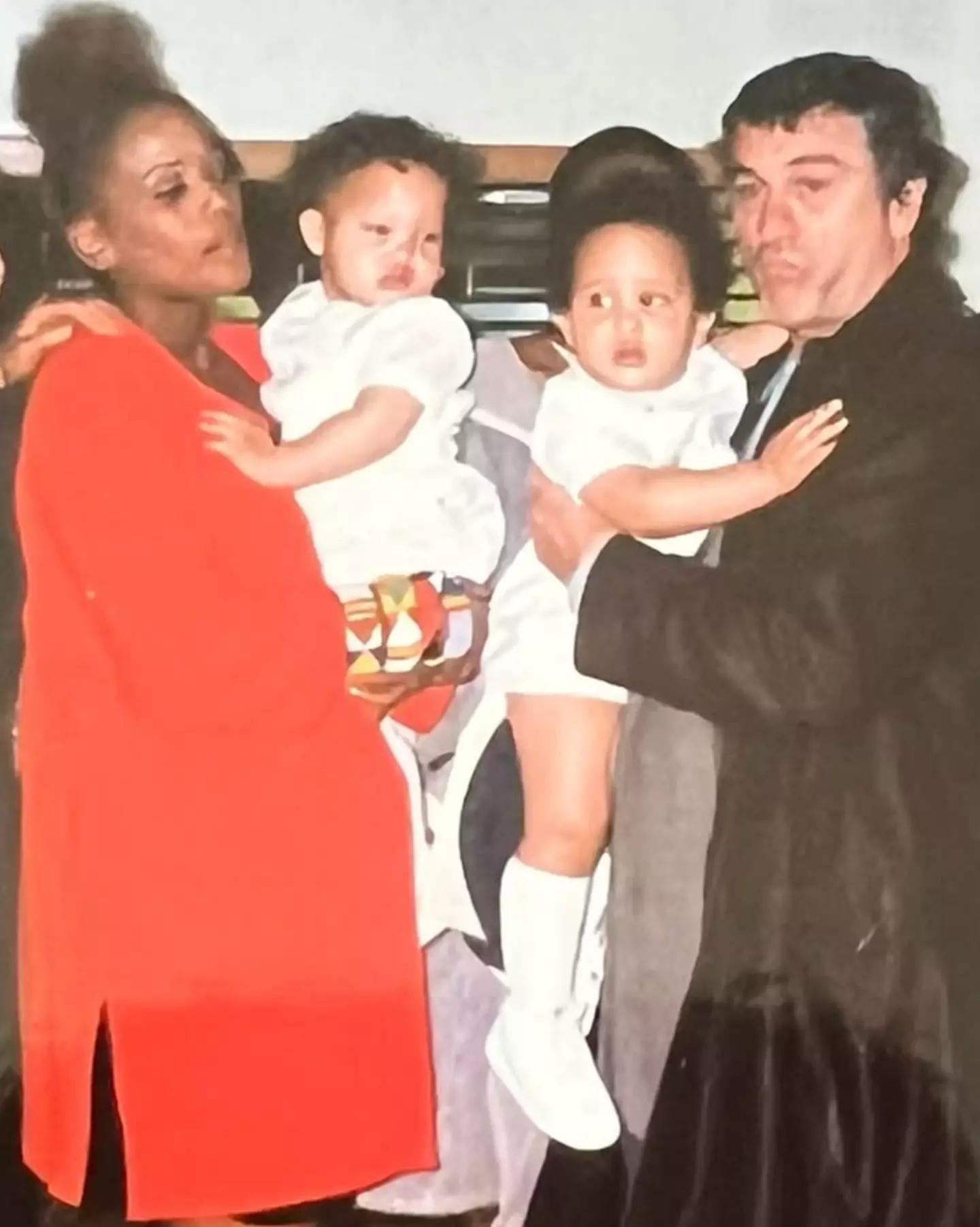 Airyn and her twin brother pictured back in the '90s being held by their parents Tookie Smith and Robert De Niro (Instagram/voiceofairyn)