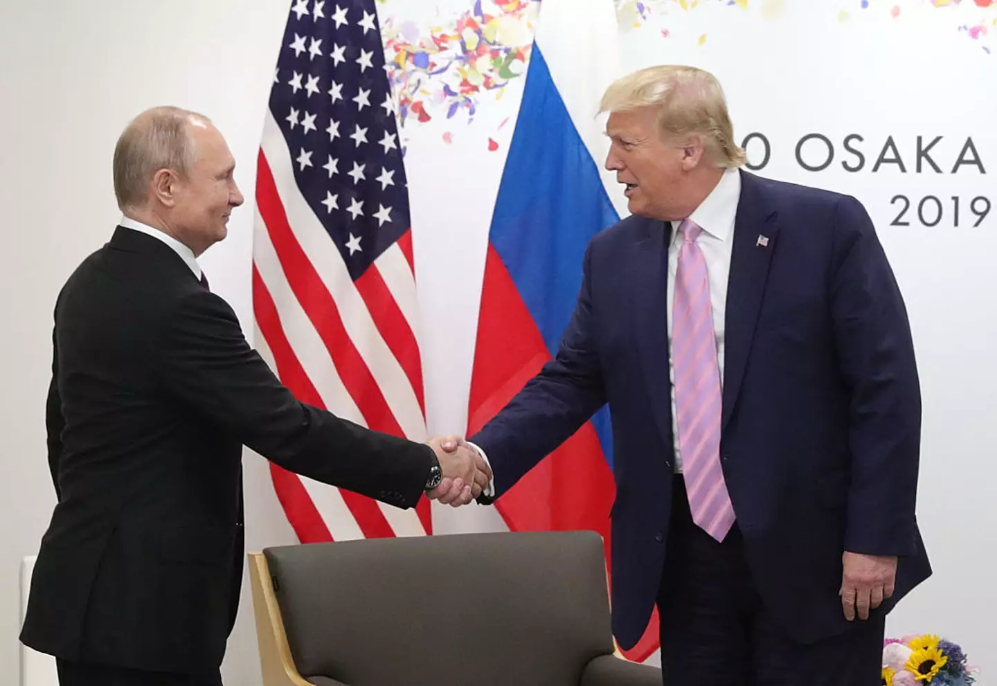 Trump and Putin photographed in 2019 (MIKHAIL KLIMENTYEV/SPUTNIK/AFP via Getty Images)