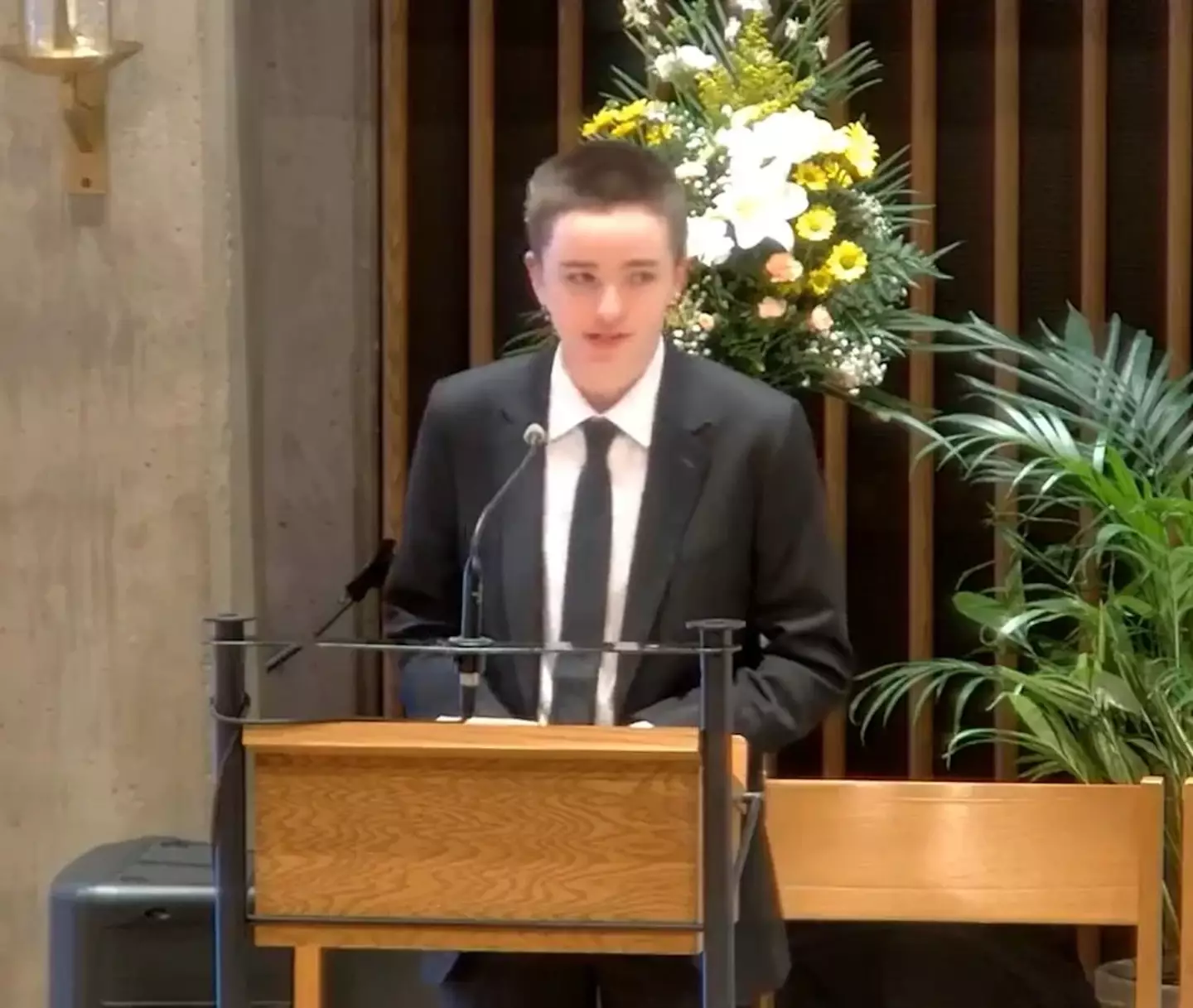 Fin Affleck gave a tribute at their grandad's funeral, as well as introducing their new name. (Facebook)