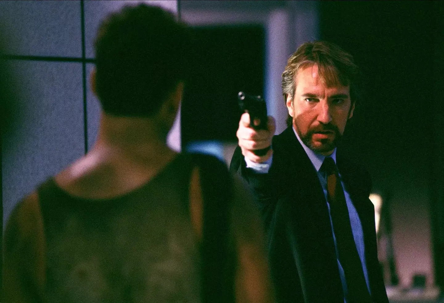 Rickman plays cat and mouse with Willis' hero, John McClane.