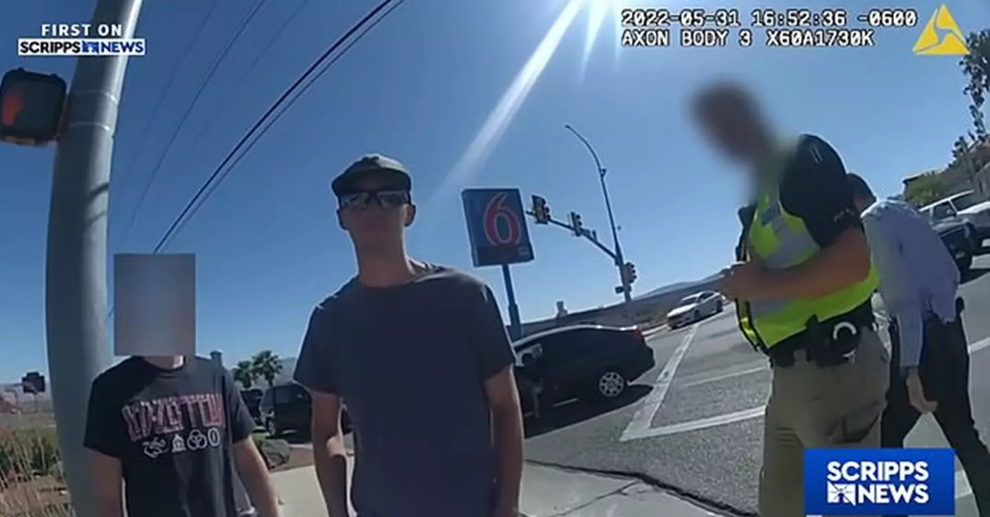 Tyler Robinson is seen on bodycam footage following a car crash (YouTube/Scripps News)