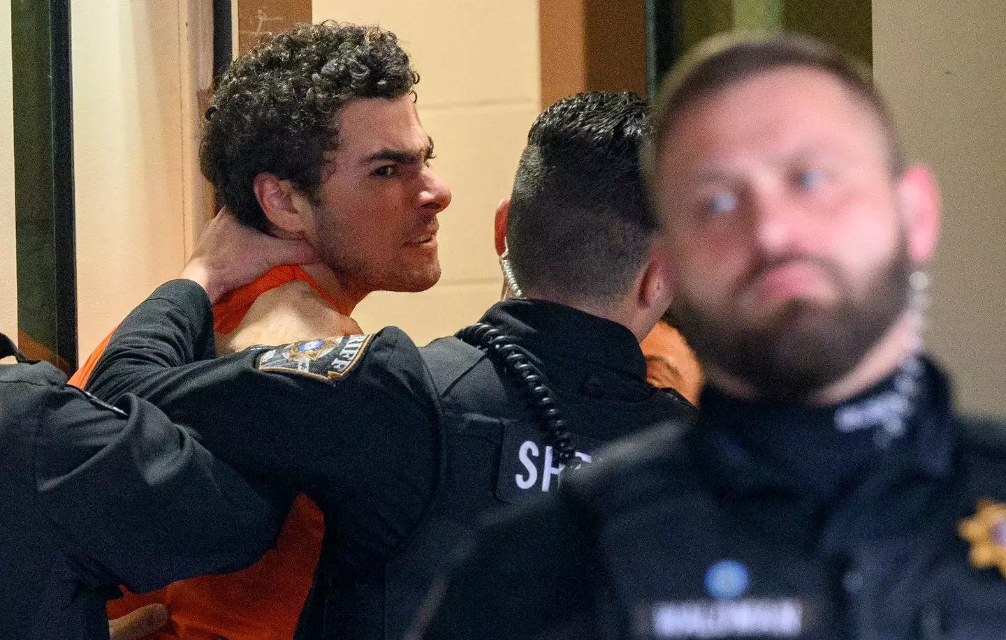 Luigi Mangione was seen yelling at reporters (Jeff Swensen/Getty Images)