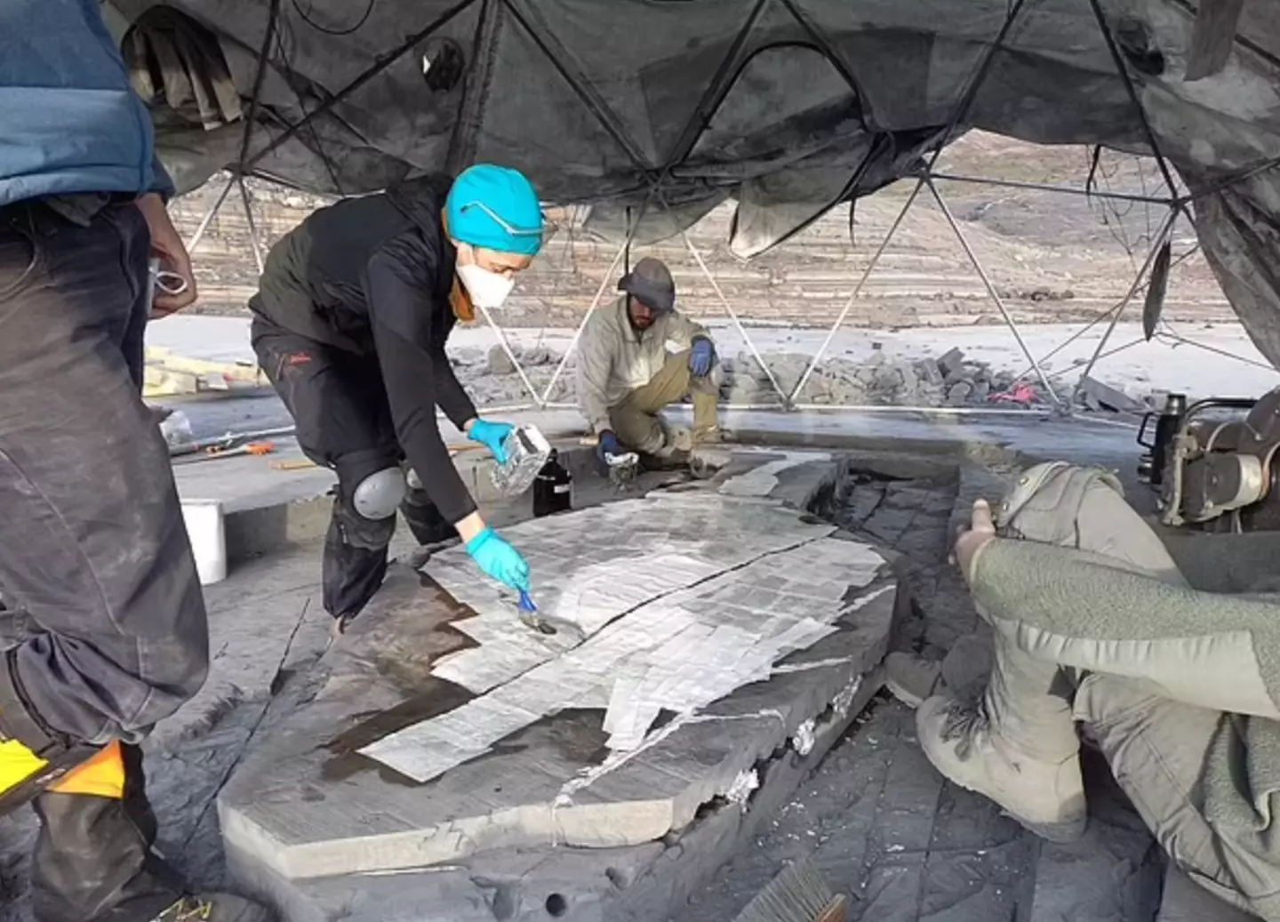 The team out in Chile under a hangar to help combat the extreme weather conditions.