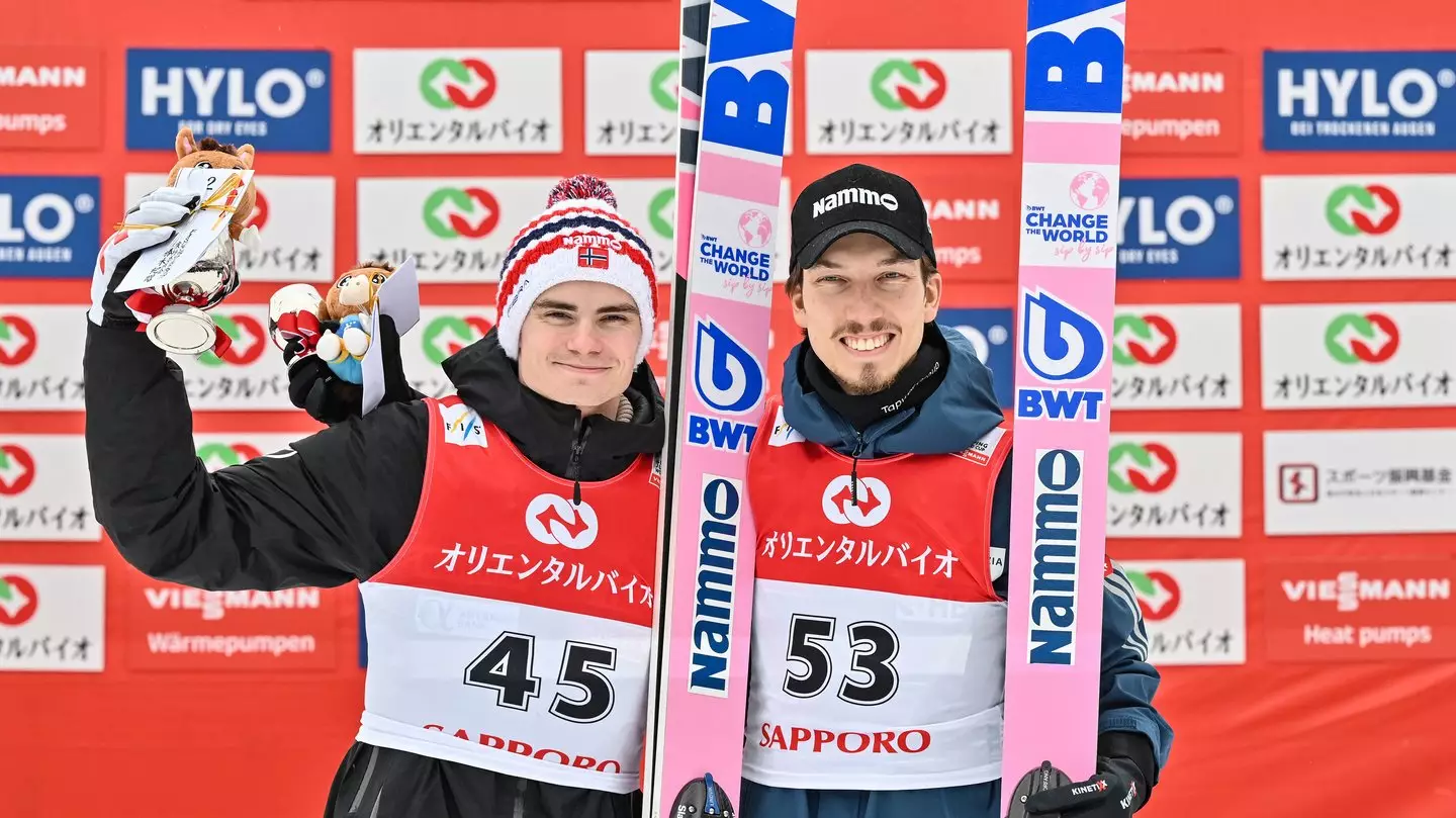 Norway's Marius Lindvik (L) and Johann Andre Forfang (R) will be permitted to compete at the Winter Olympics next month (GEORG HOCHMUTH / Getty Images)