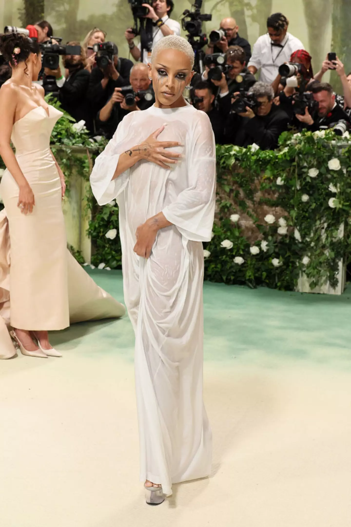 The singer's second outfit was an oversized wet-look t-shirt dress, much to many fan's disappointment. (Dia Dipasupil/Getty Images)