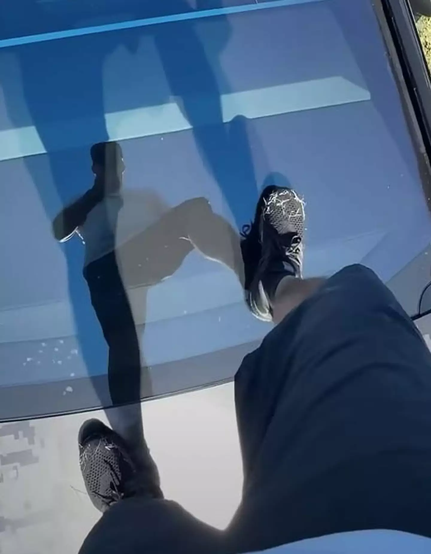 The man cracked the windshield (YouTube/Tesla Owners Silicon Valley)