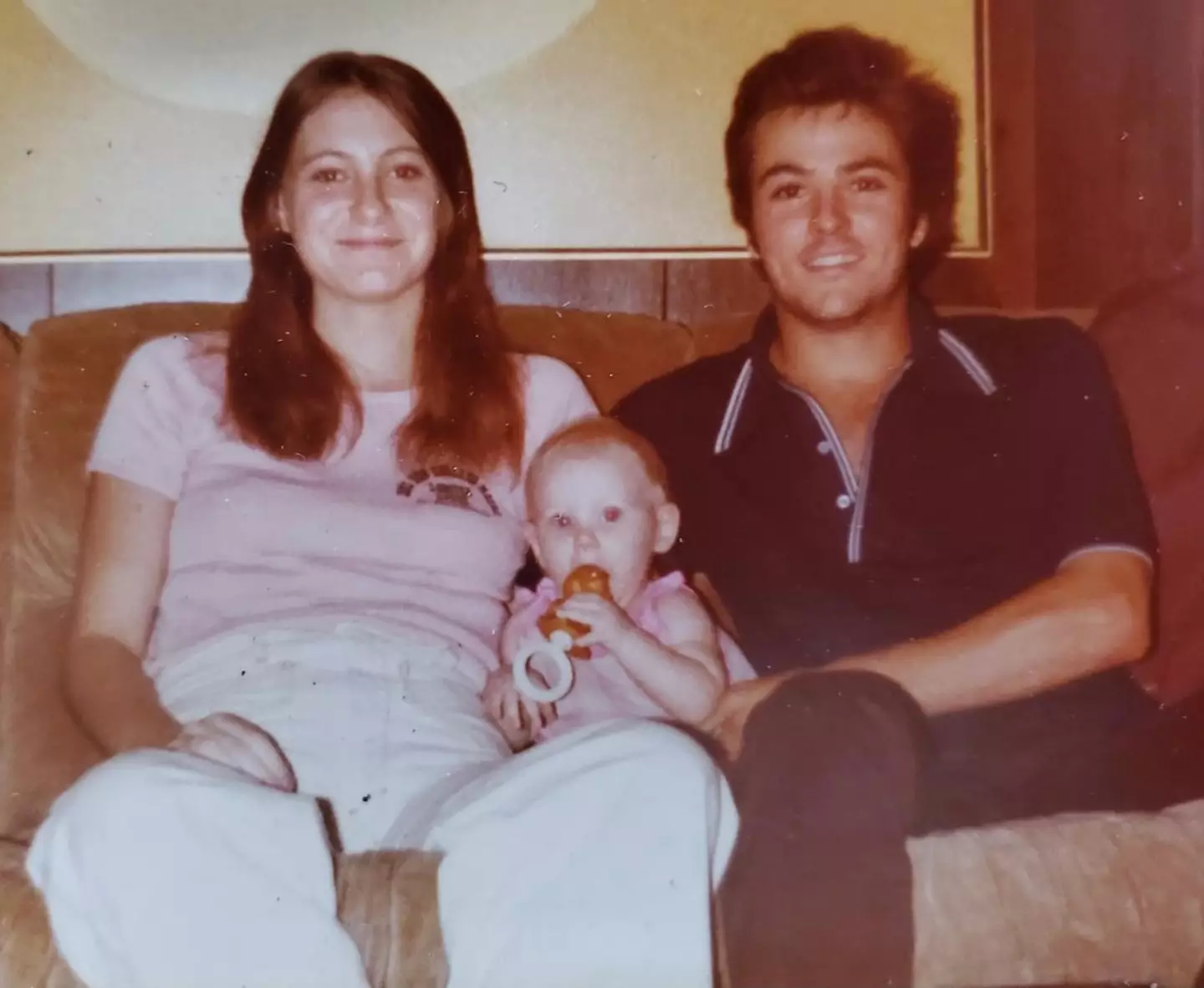 Tina Gail and Harold Dean Clouse with Holly as a baby.