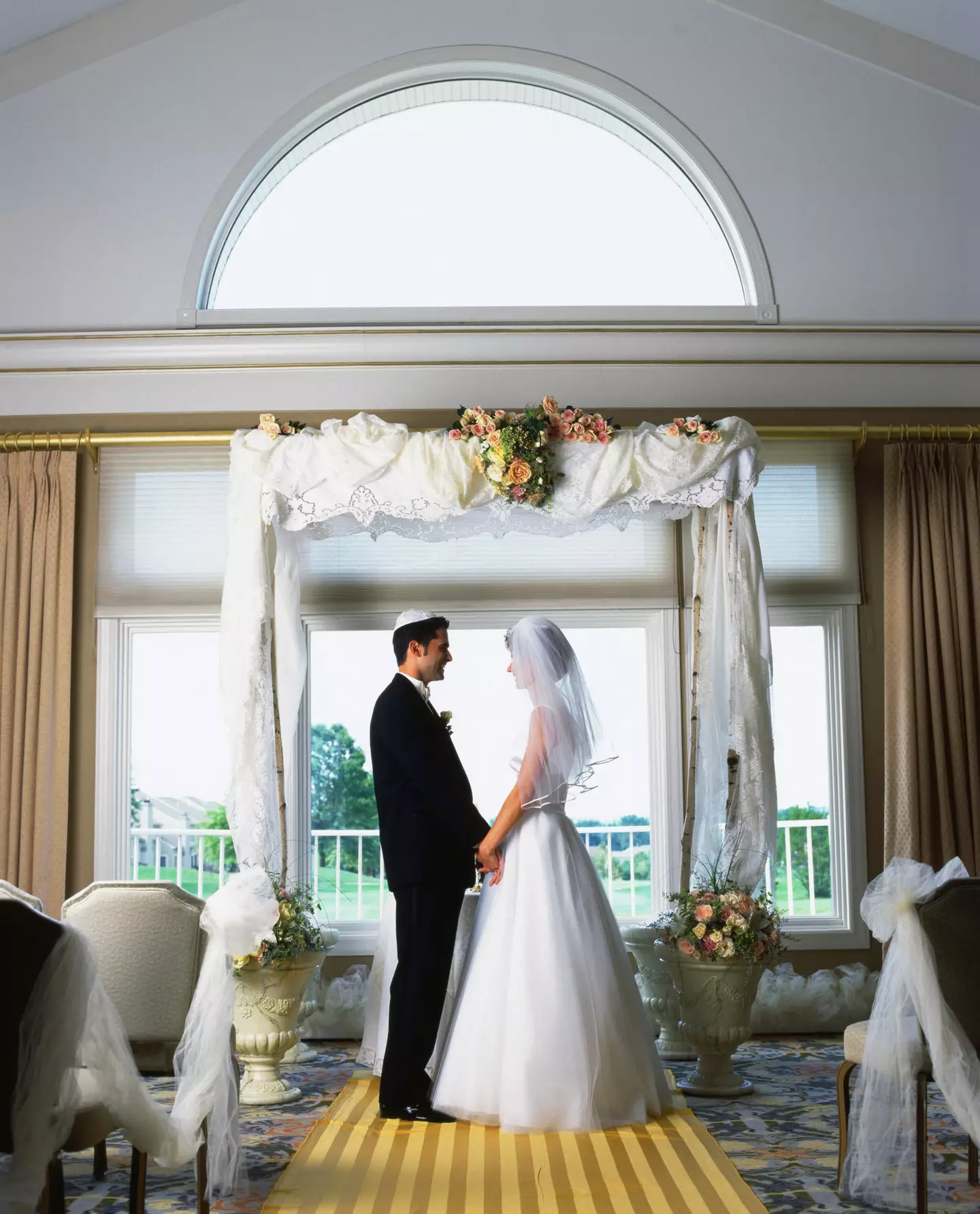 A chuppah is a wedding canopy, positioned above the bride and groom, used in Jewish ceremonies (Getty stock)