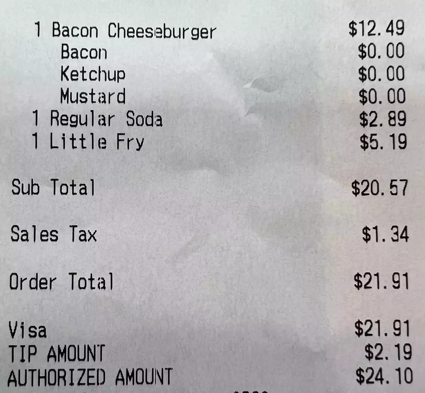 The receipt showed just how much the burger, fries, and soda cost.