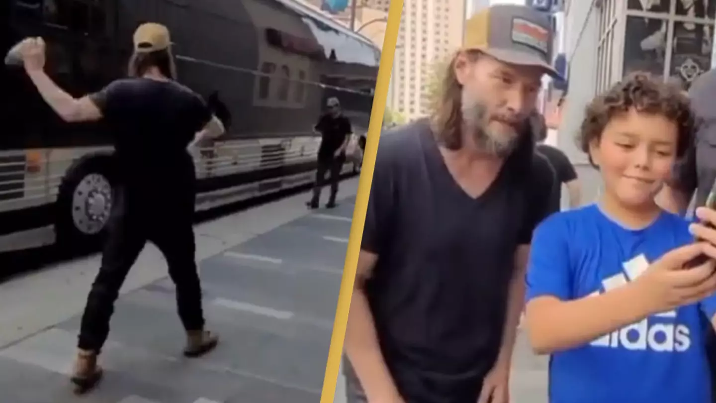 Keanu Reeves plays catch with young fan in middle of street
