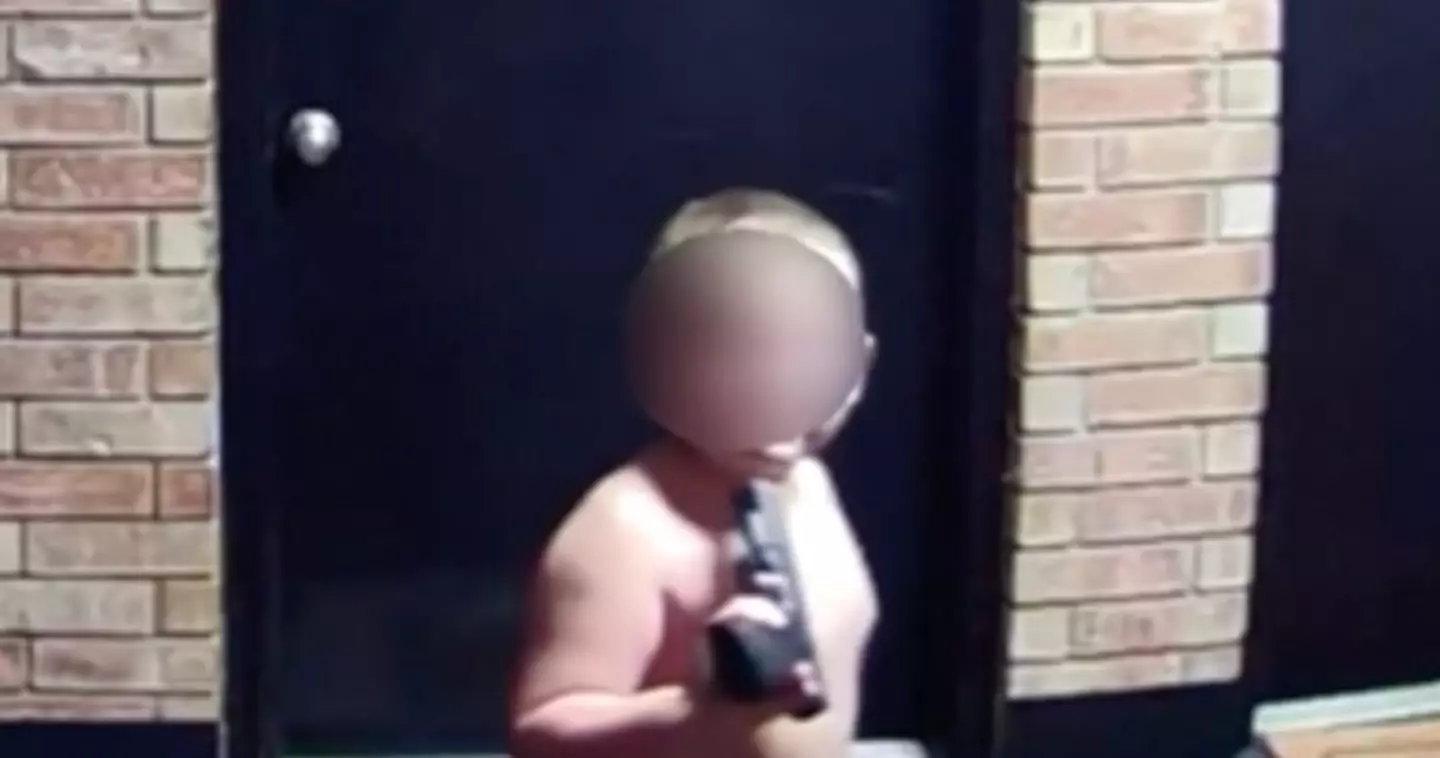 Footage showed the young child playing with a loaded gun.
