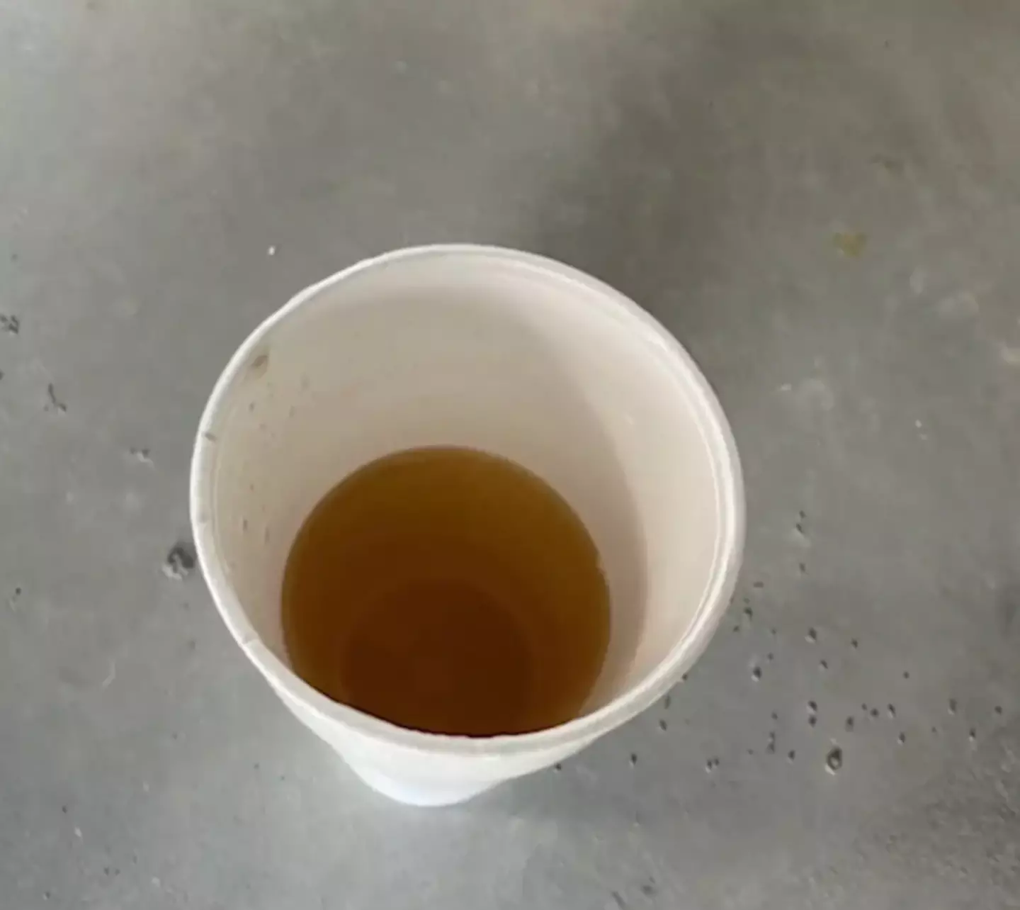 The cup was full of urine.