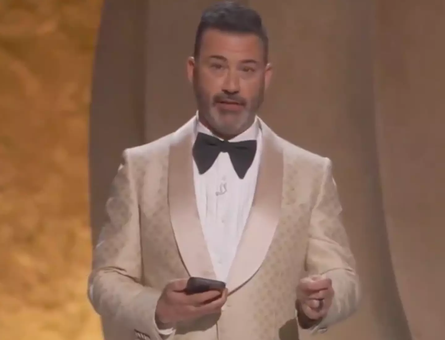 The room then erupted in laugher and cheers after Kimmel hit back at Trump.