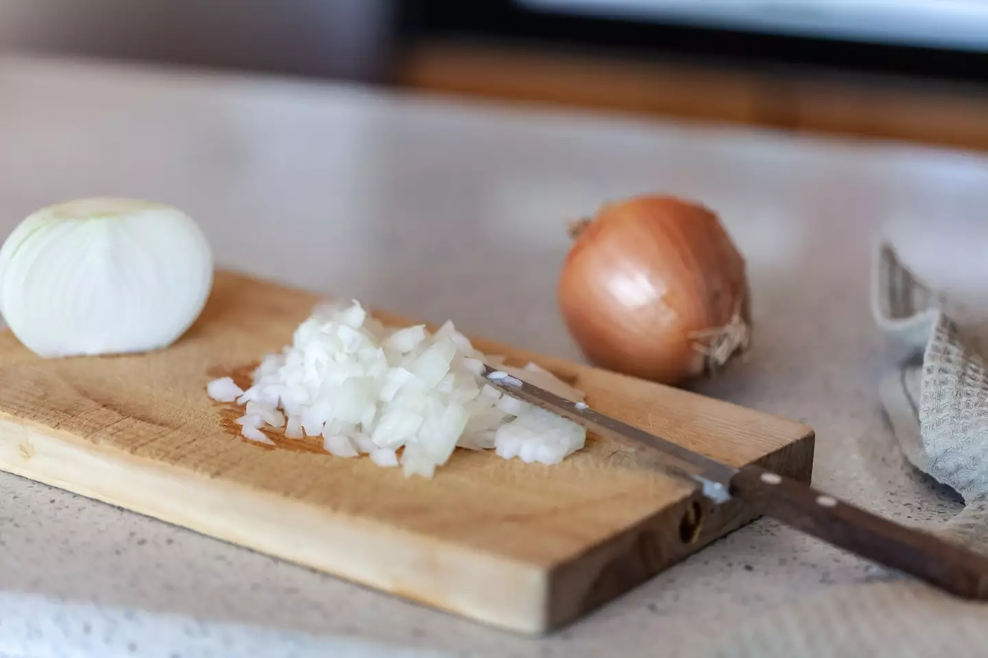 Onions should not be refrigerated, according to the expert (Getty Stock Photo)