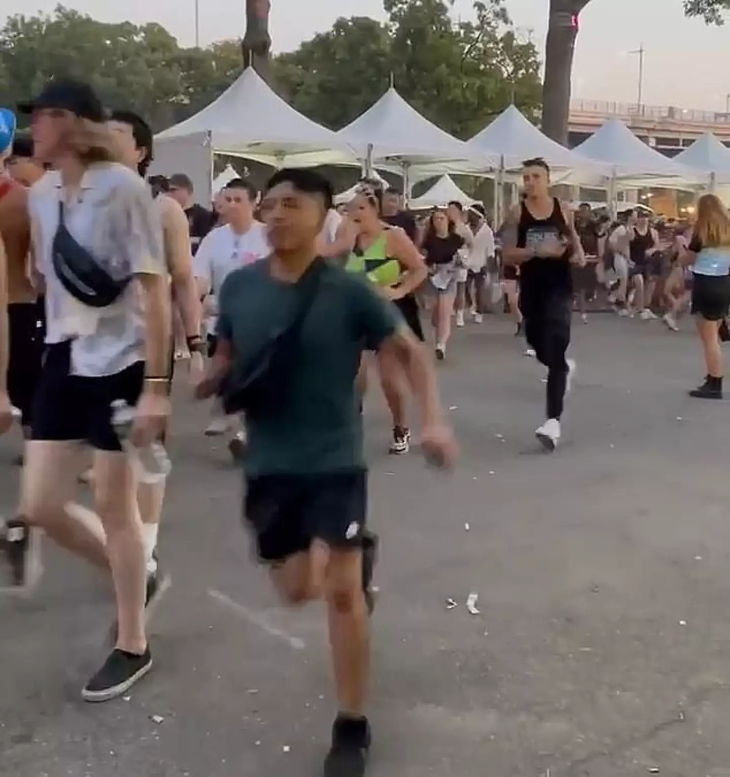 A number of videos on social media show the incredible scenes of hundreds of concertgoers storming through the security checkpoint, all the way into the venue on Randall's Island.