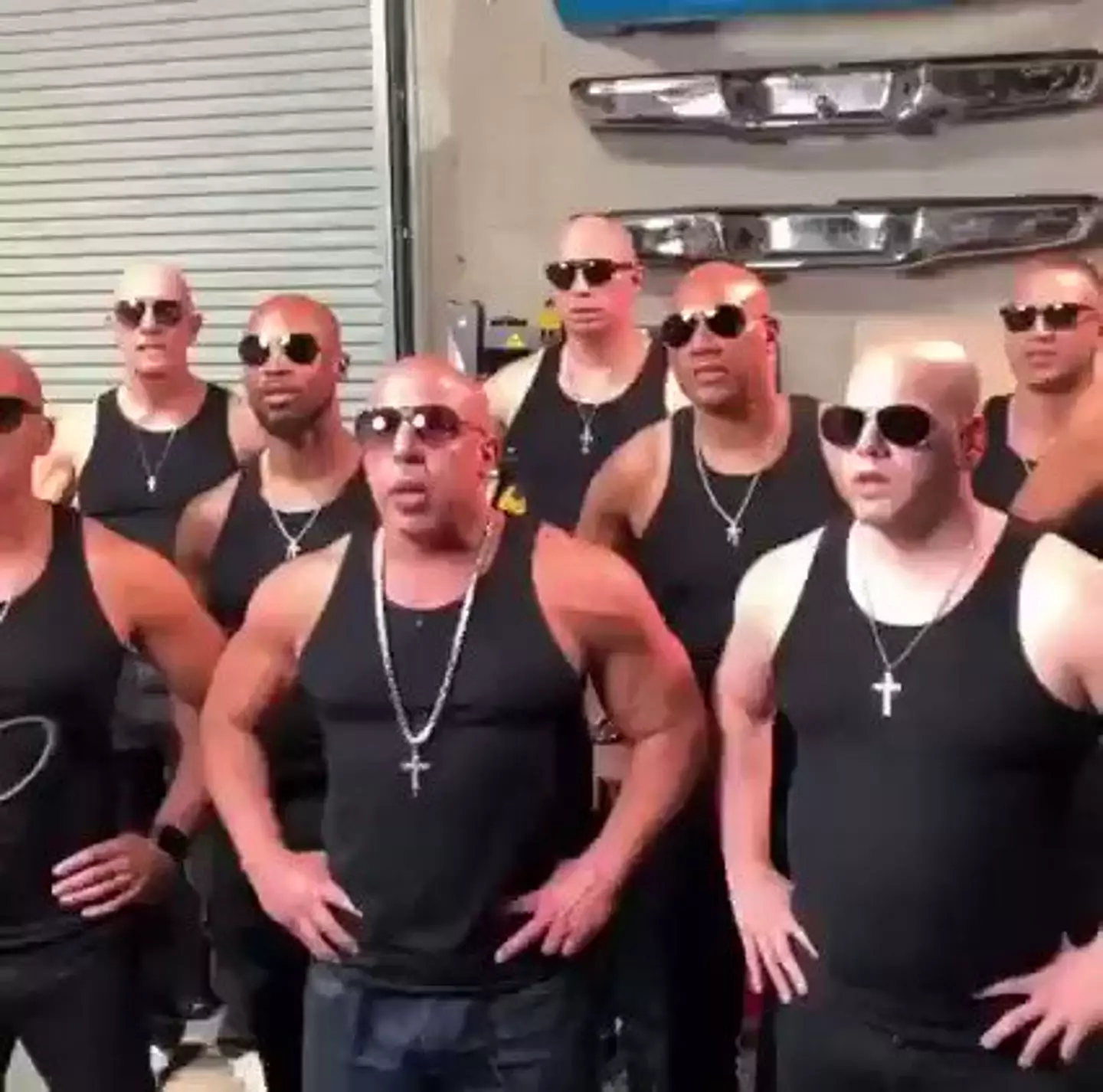 The group of bald men say 'family' in unison in this meme.