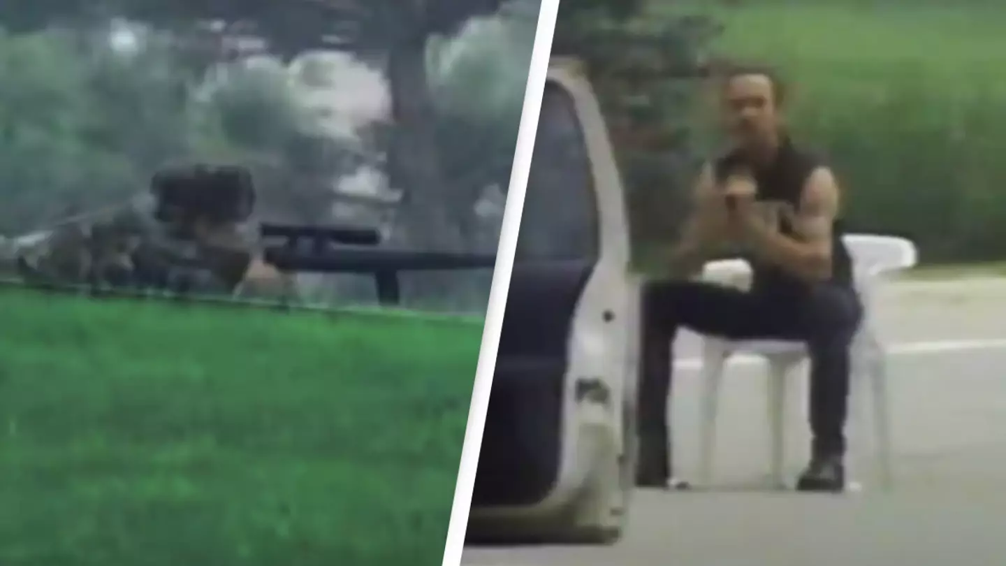 Incredible moment sniper takes one in a million shot to blast gun out of man's hands without harming him