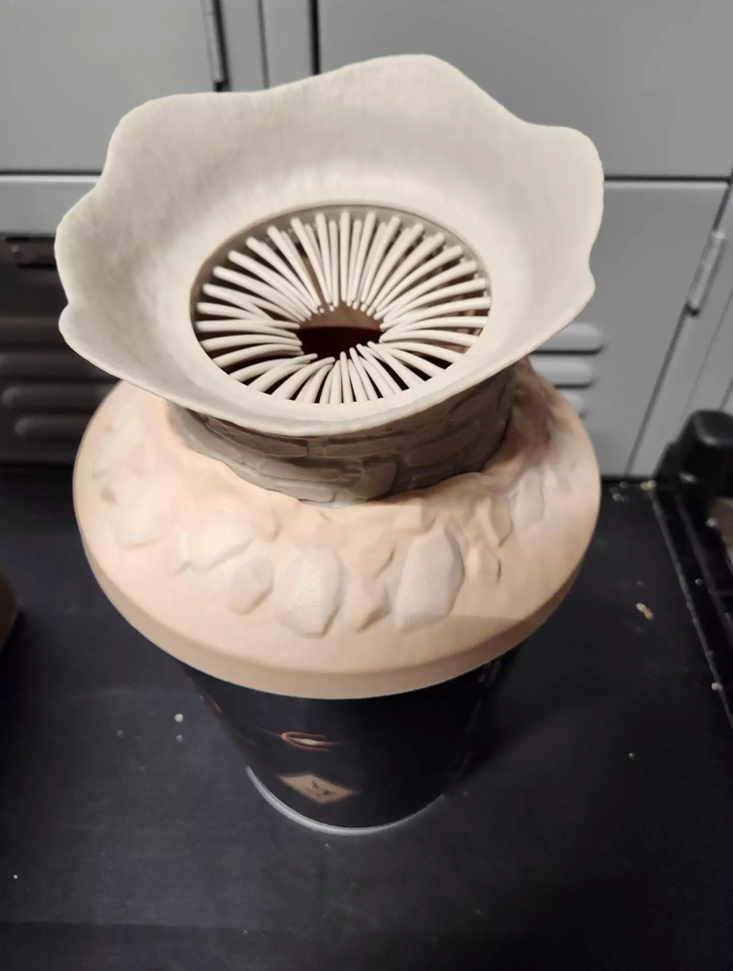 The bucket is meant to represent a worm's mouth... right?