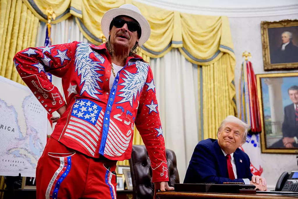 Kid Rock, pictured here with Donald Trump, was one of the 'alternative' halftime performers (Andrew Harnik/Getty Images)