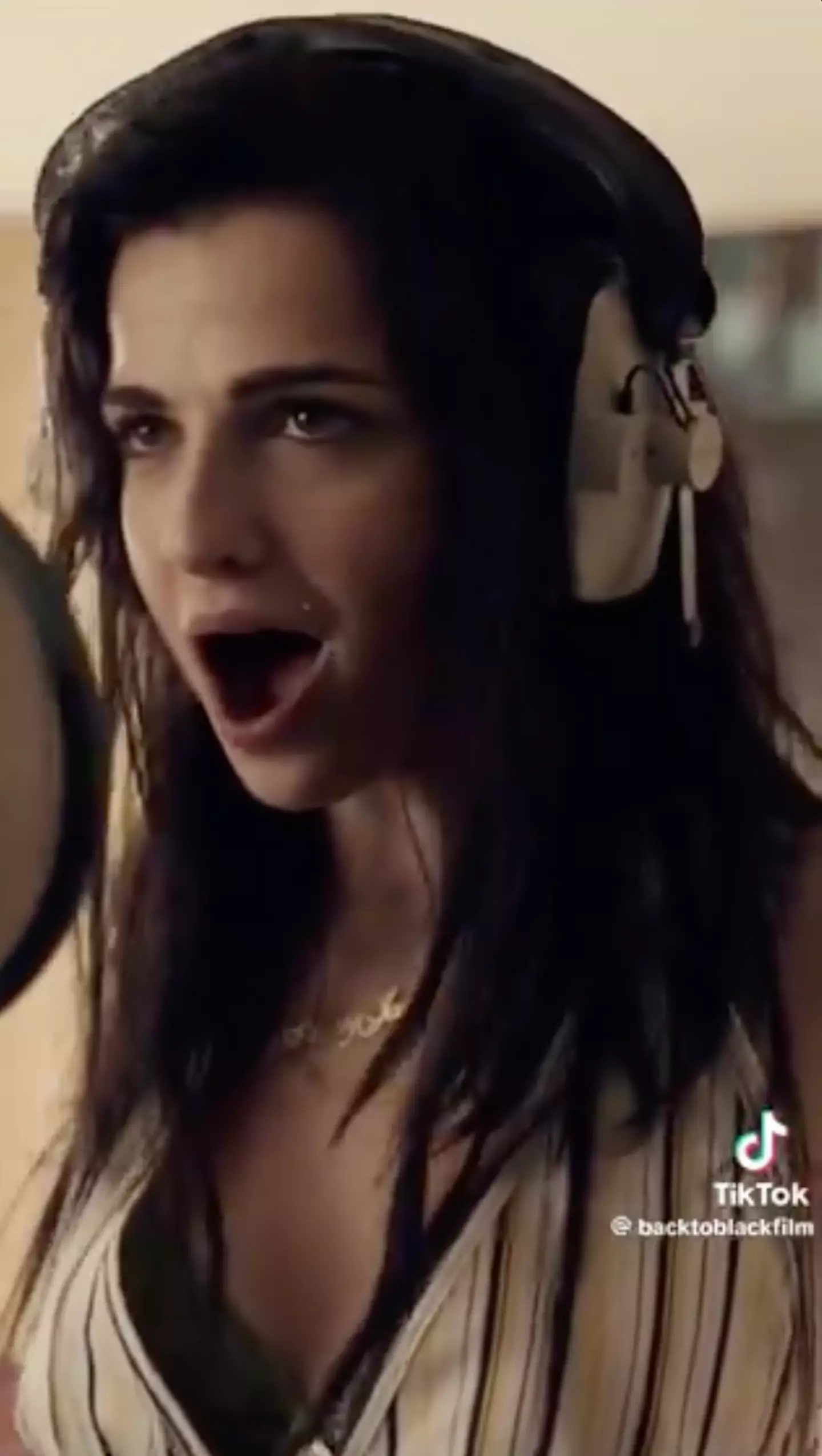 Marisa Abela as Amy Winehouse.