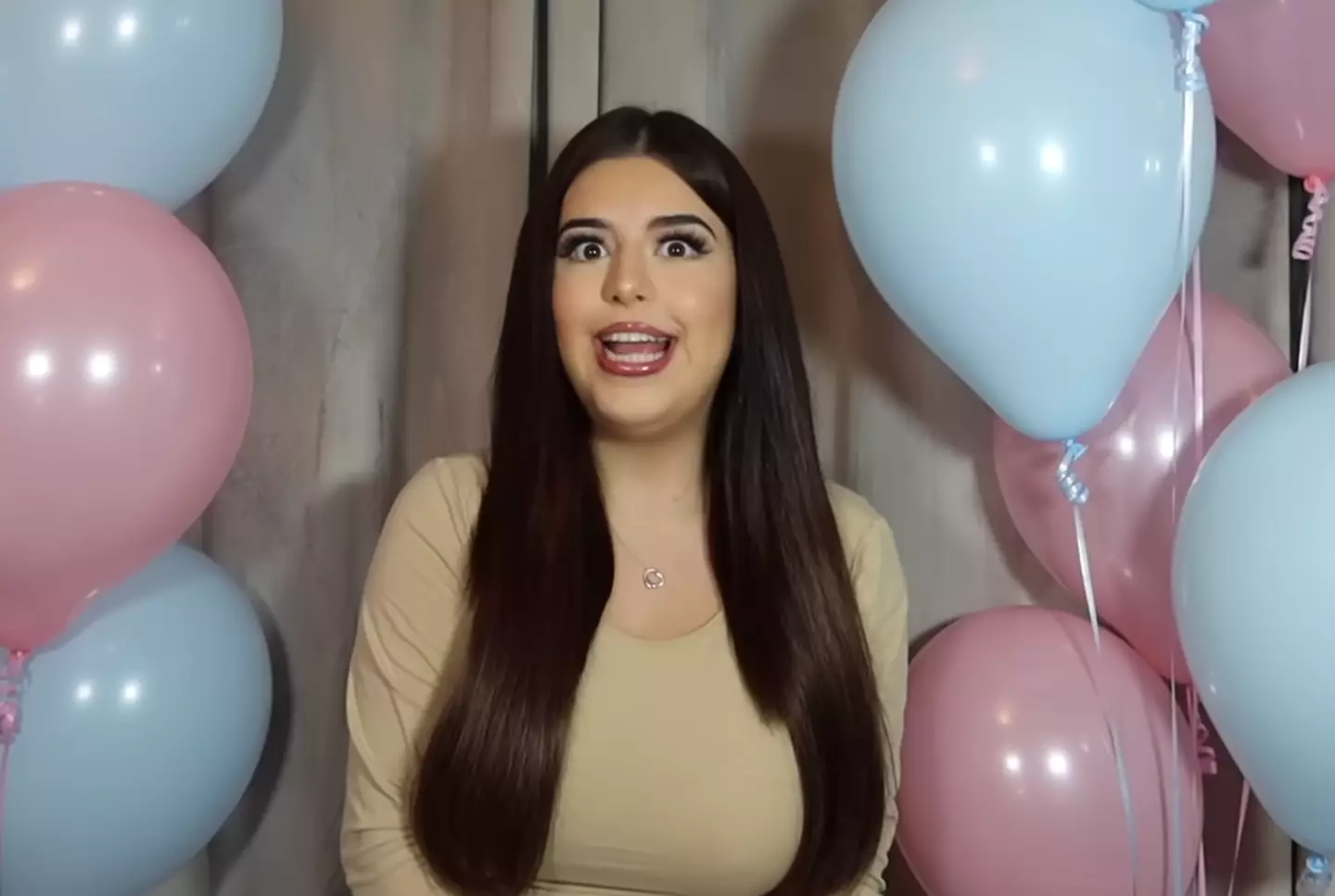 Sophia revealed her baby news on YouTube.