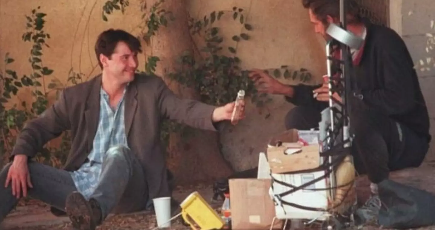 Keanu Reeves was pictured sitting and chatting with a homeless man in 1997.