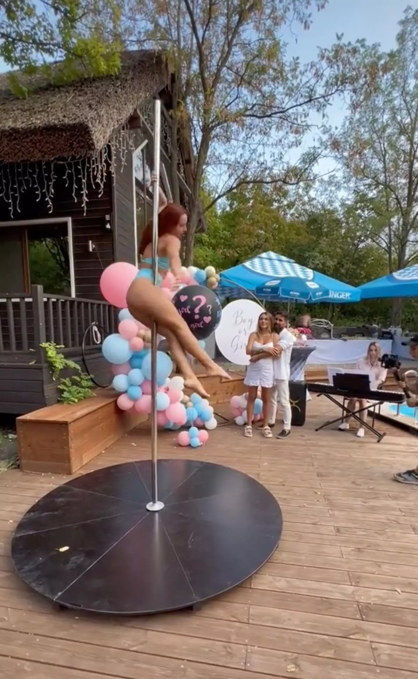 A couple from Moldova have sparked outrage after hiring pole dancers to reveal the gender of their baby.