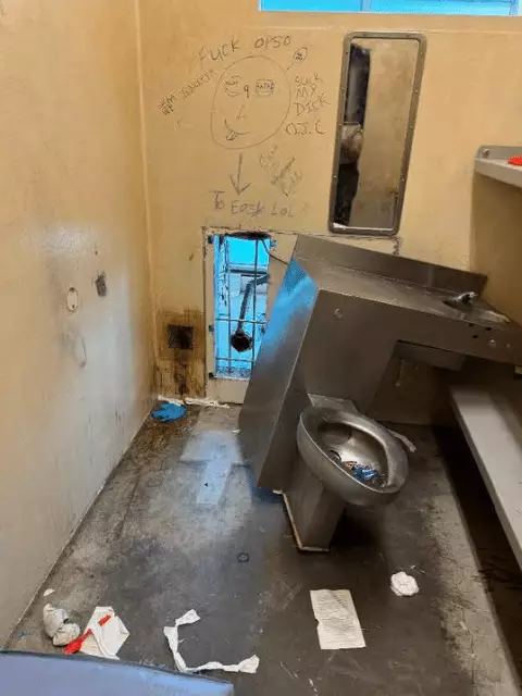 The inmates wrote 'To easy LOL' on the wall, while the picture reveals how the criminals escaped through the back of the toilet (Orleans Parish Sheriff's Office)