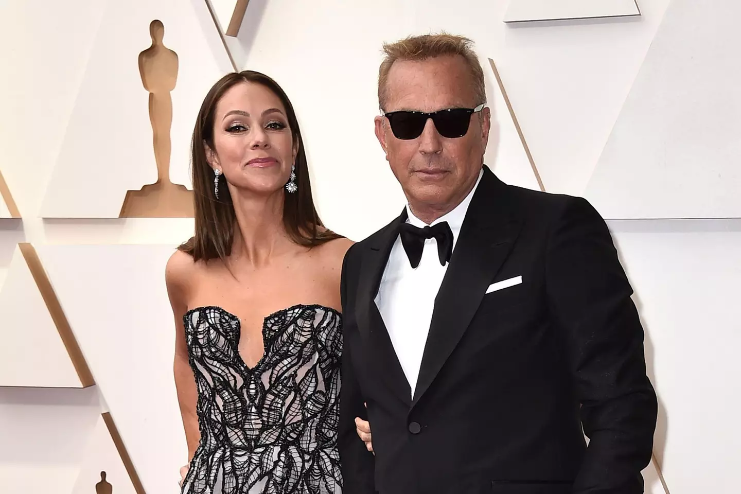 Christine Baumgartner and Kevin Costner.