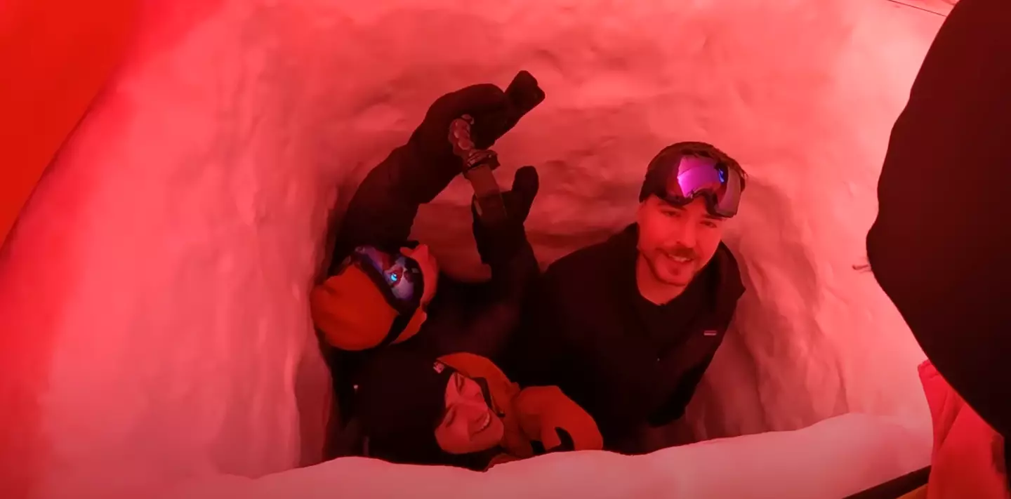 At one point, MrBeast and co decided to build a large hole in the snow.