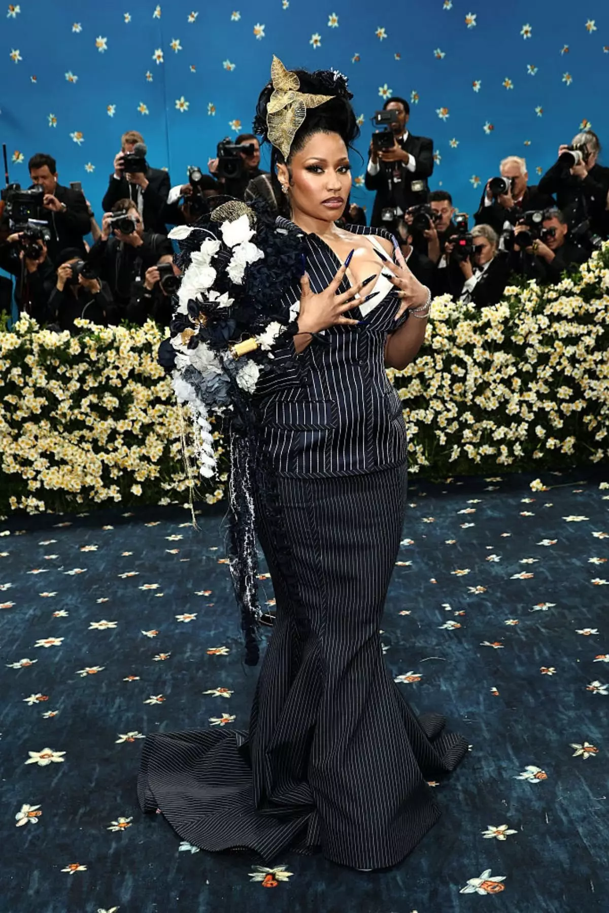 Nicki Minaj was in attendance at the 2025 Met Gala, wearing Thom Browne (Jamie McCarthy/Getty Images)