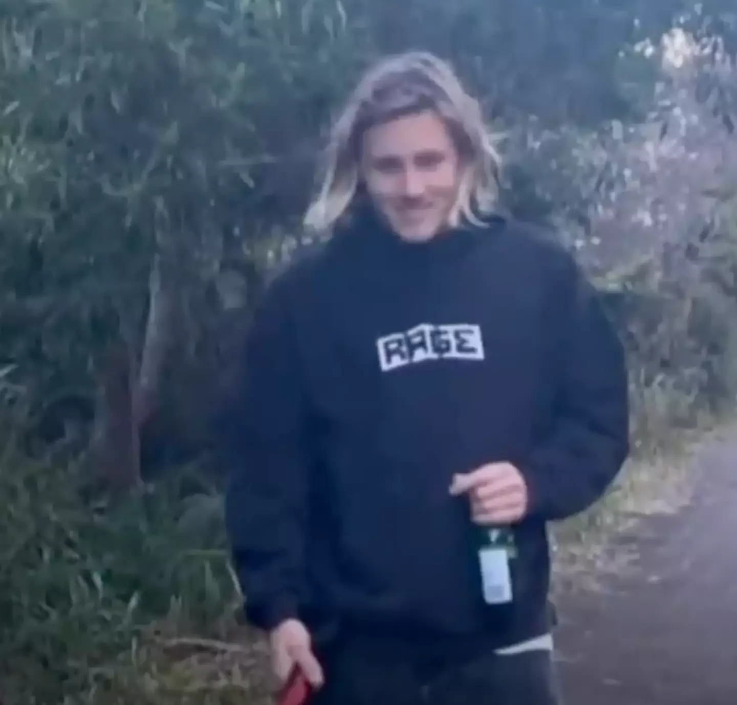 Kai Mackenzie was attacked by the shark while out surfing (7News)