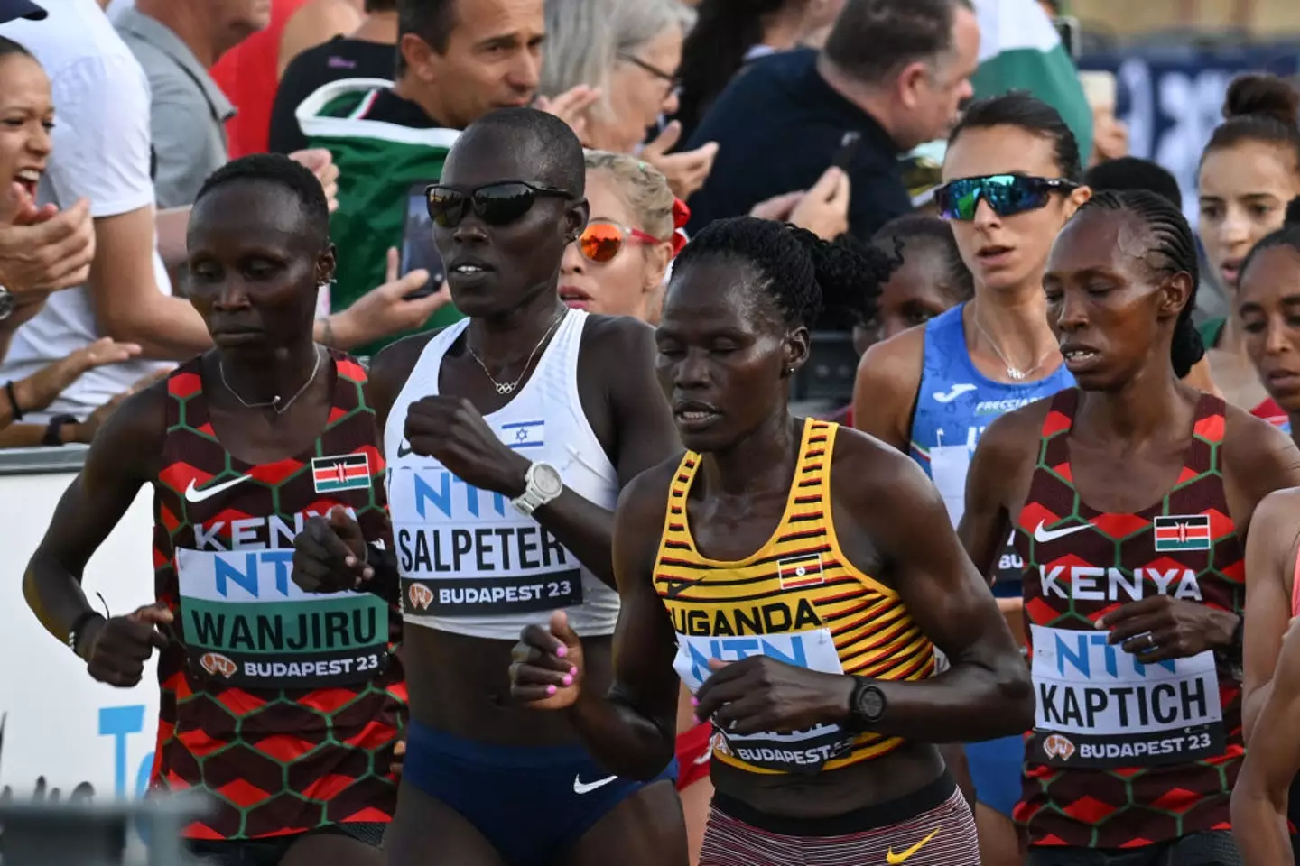 Uganda's Rebecca Cheptegei pictured in yellow and black at the the women's marathon final during the World Athletics Championship last year (FERENC ISZA/AFP via Getty Images)