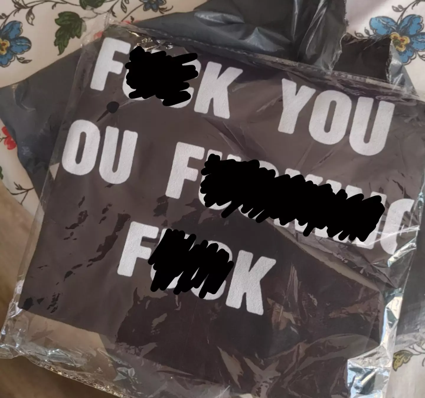 The customer was shocked by the T-shirt she received.