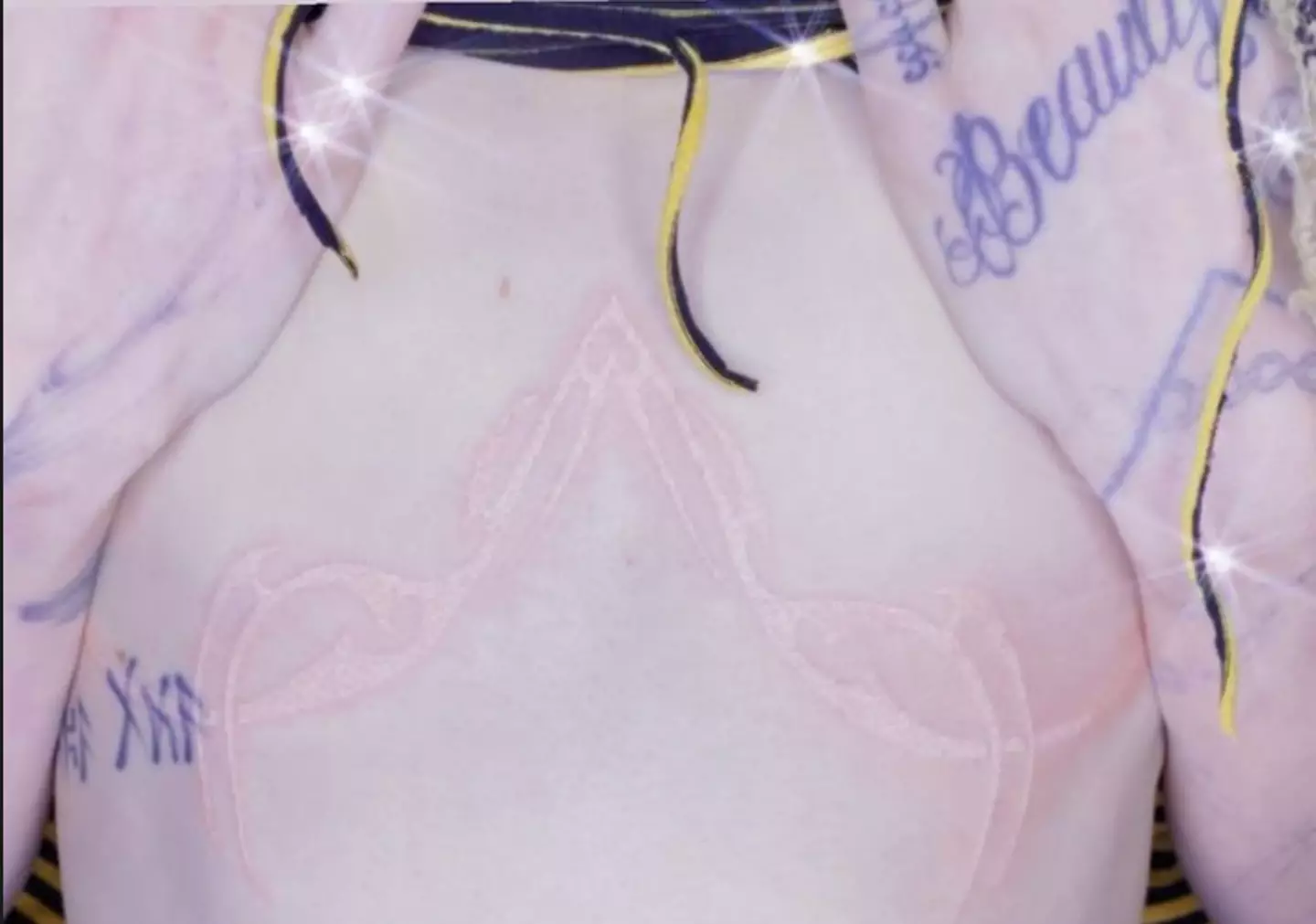Grimes chest tattoo (@grimes/Instagram)