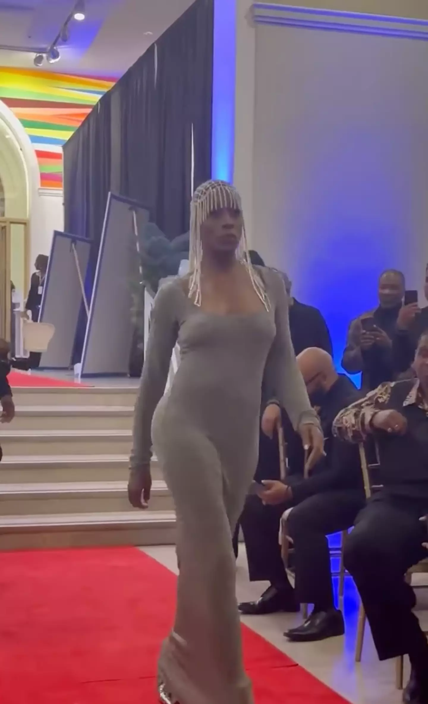 Erica L Carrington took to the runway during an open-casket funeral.