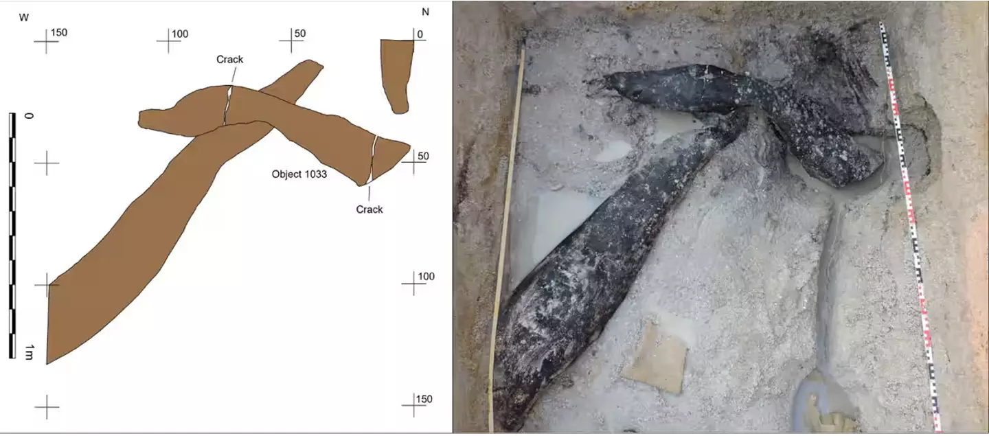 The structure features two logs that have been tooled.