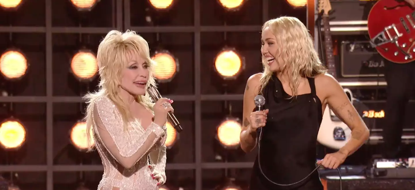 Miley Cyrus with godmother Dolly Parton.