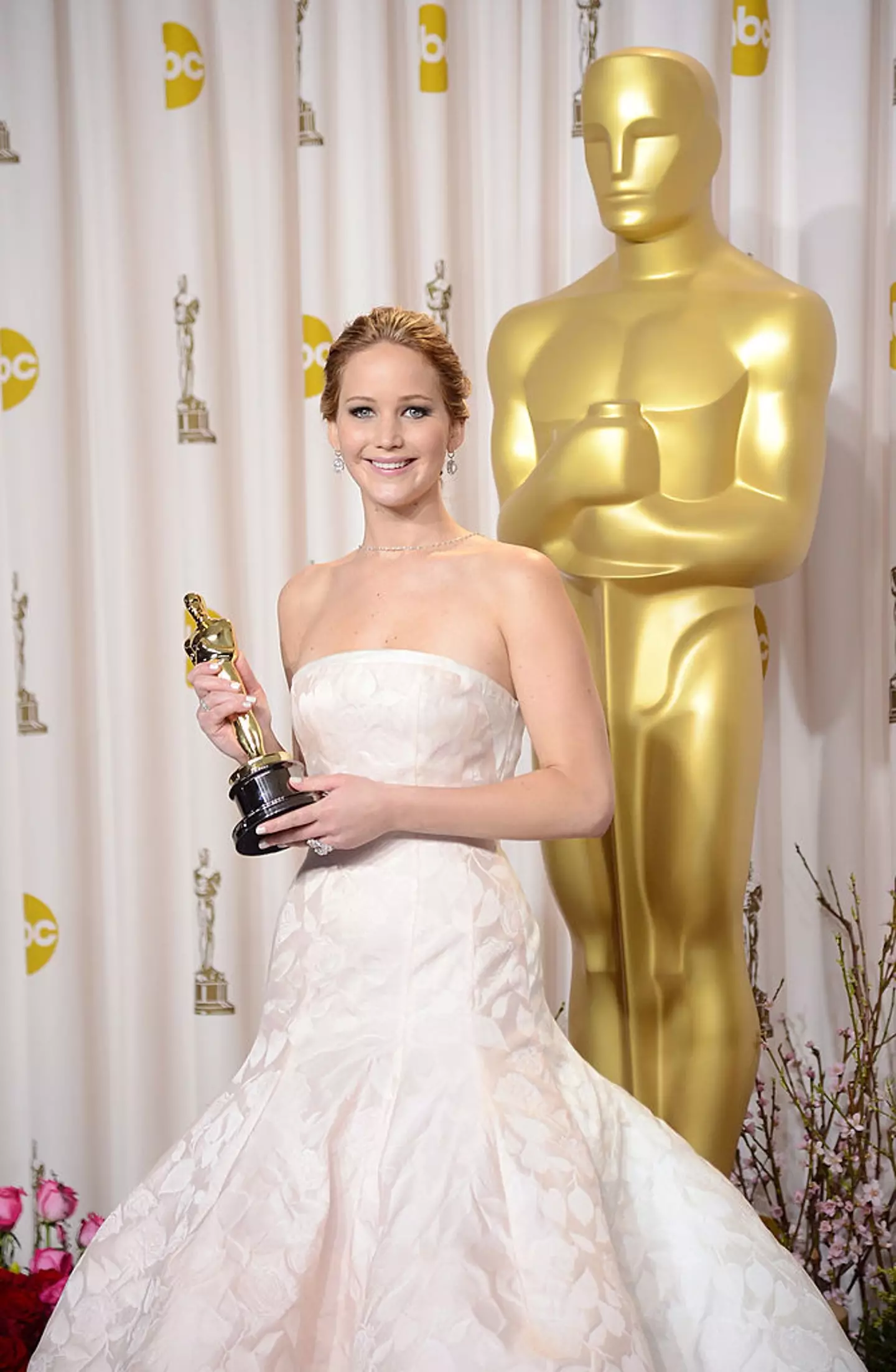 Jennifer Lawrence gripping her Oscar in 2013 for Best Performance by an Actress in a Leading Role for her role in Silver Linings Playbook(Jason Merritt/Getty Images)