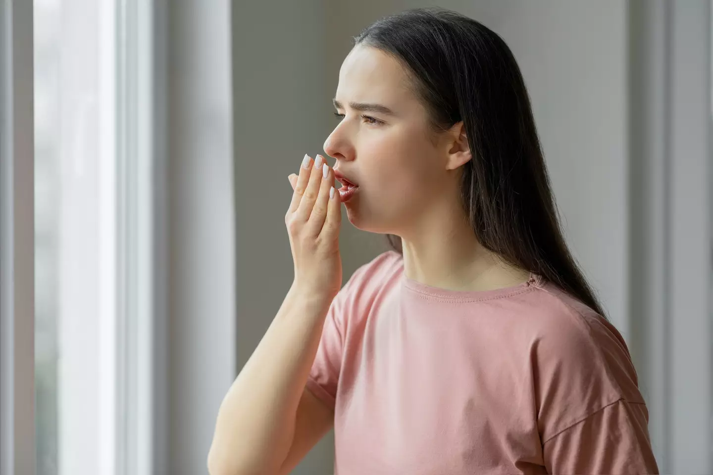 The pros warn bad breath is common (Getty Stock Image)