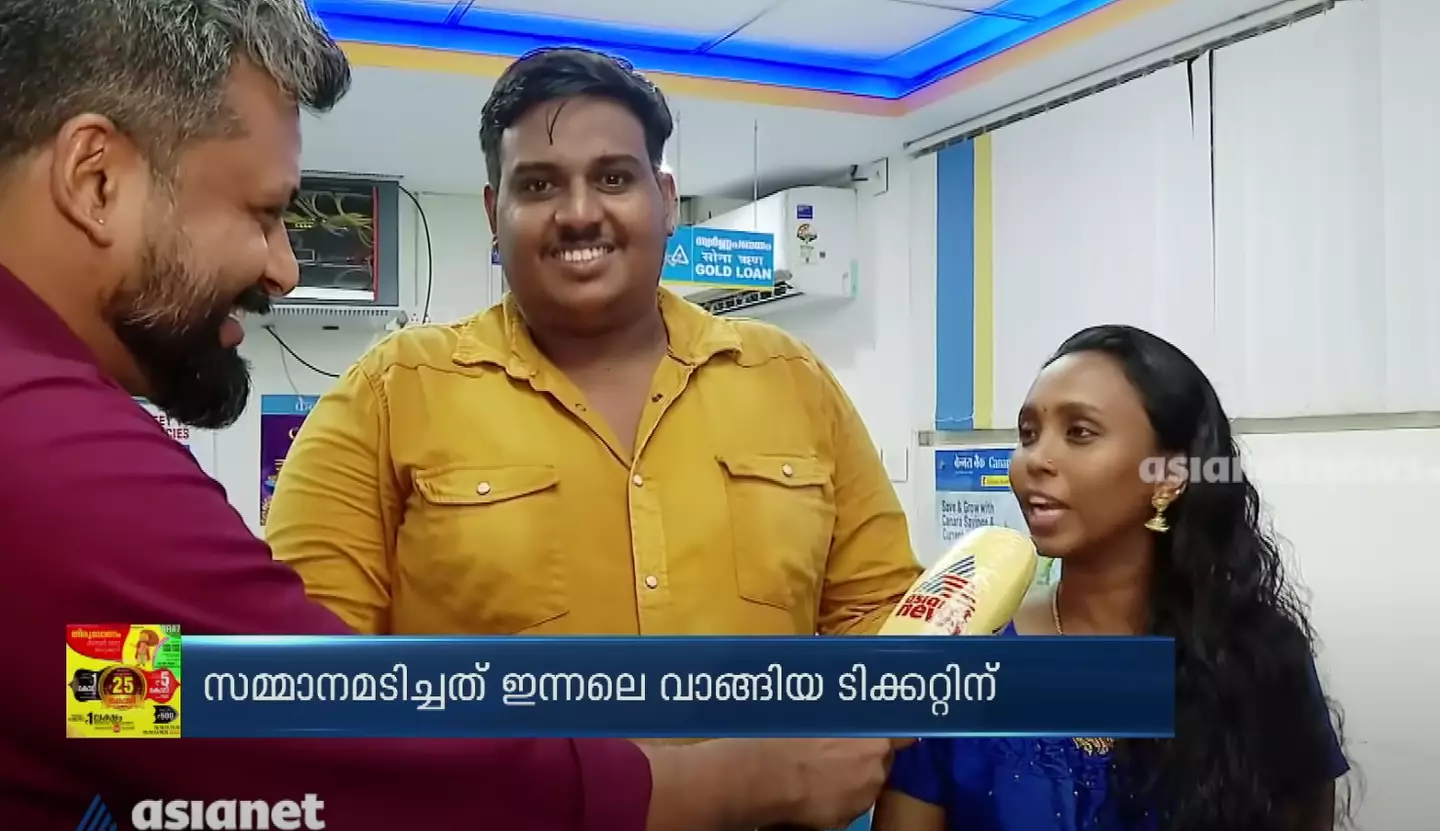 Anoop and his wife following the win.