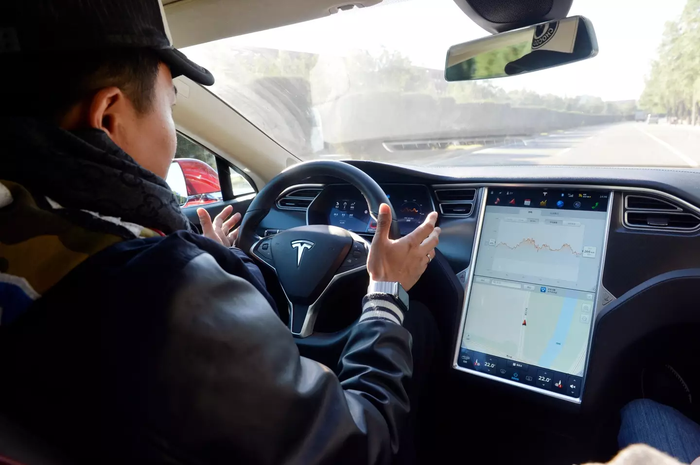 Even if the car can drive itself Tesla have been clear someone should be behind the wheel.