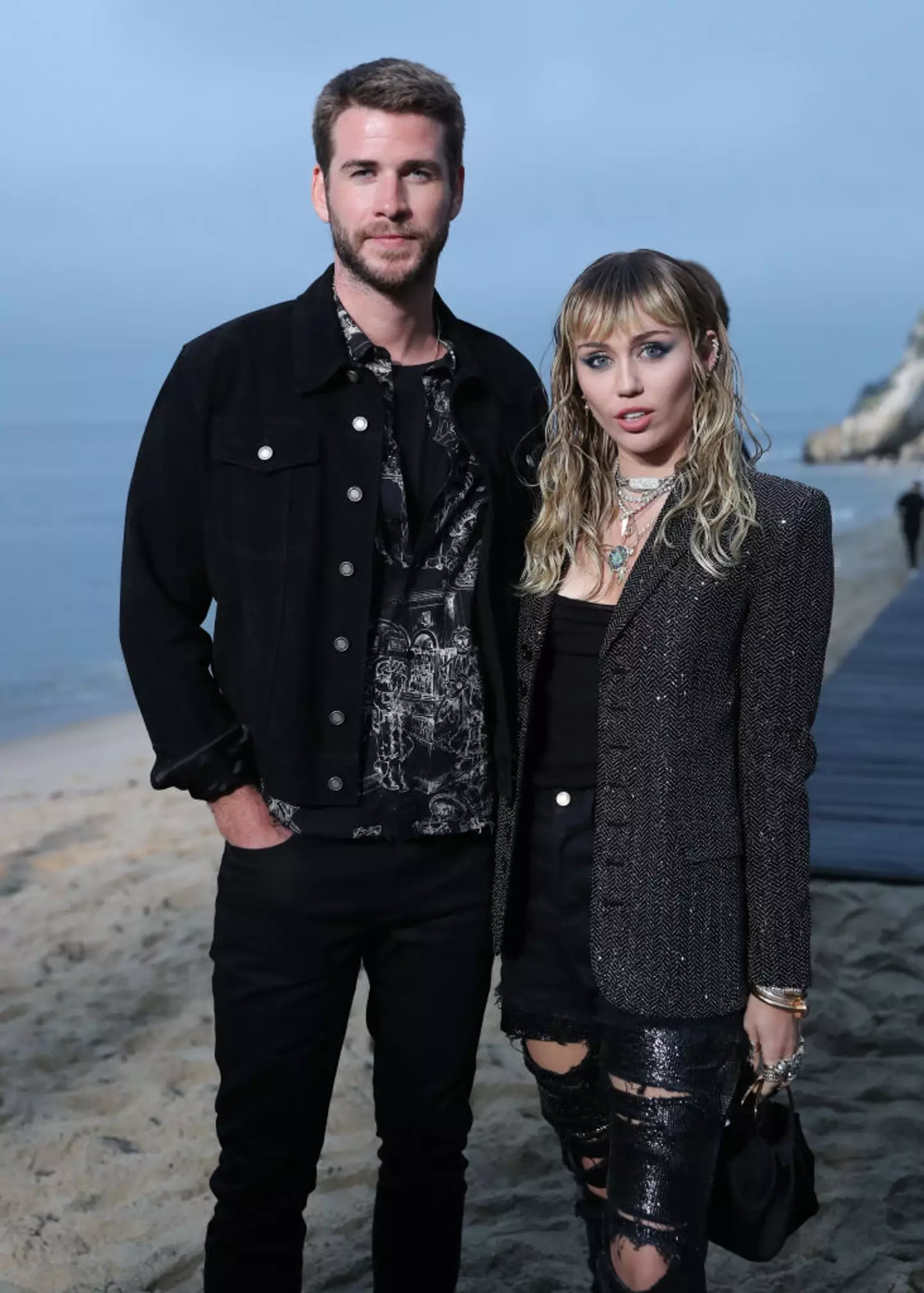 Hemsworth and Cyrus pictured while married in June 2019 - two months before announcing their split (Chelsea Lauren/WWD/Penske Media via Getty Images)