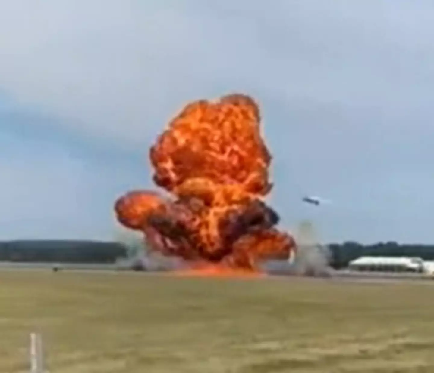 Upon releasing his parachute, Darnell's jet truck tragically exploded in flames.