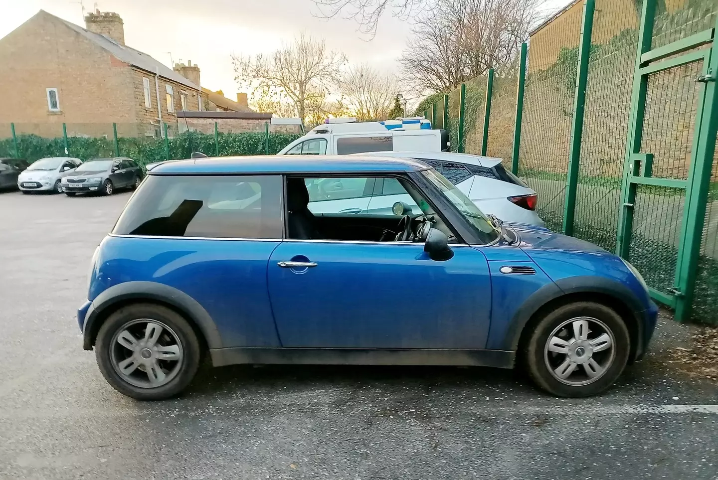 Elderly driver's blue Mini (SWNS)